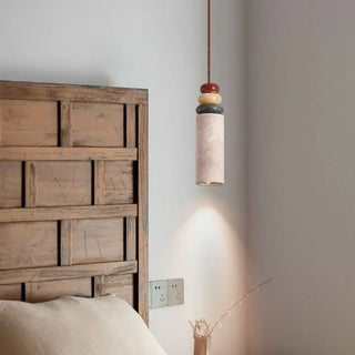 Yellow travertine pendant lamp with multi-colored wood, organic hanging ceiling light