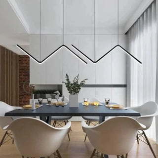 Zig zag pendant lamp over dining table — designer statement ceiling light