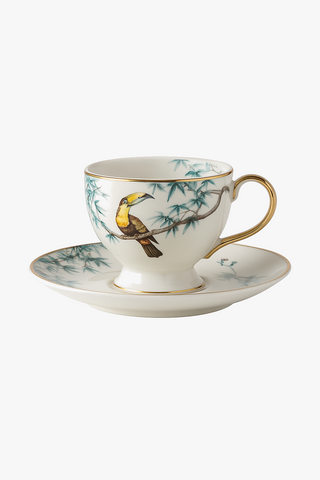 floral-motif ceramic cup with saucer