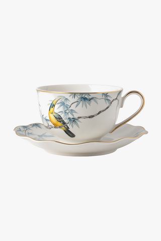 floral-motif ceramic cup with saucer