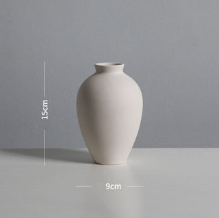 white ceramic vase modern graffiti art living room decoration close-up detail