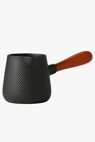cast iron teapot with infuser