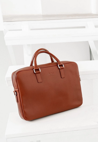 leather briefcase elegant business bag adjustable shoulder strap overhead view