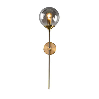 Golden wall sconce with amber shade — luxury interior wall lighting