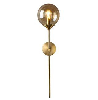 Scandinavian wall light with amber glass shade and golden sconce