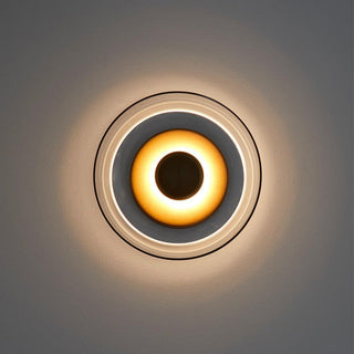 Glass wall sconce bedside detail — warm ambient LED